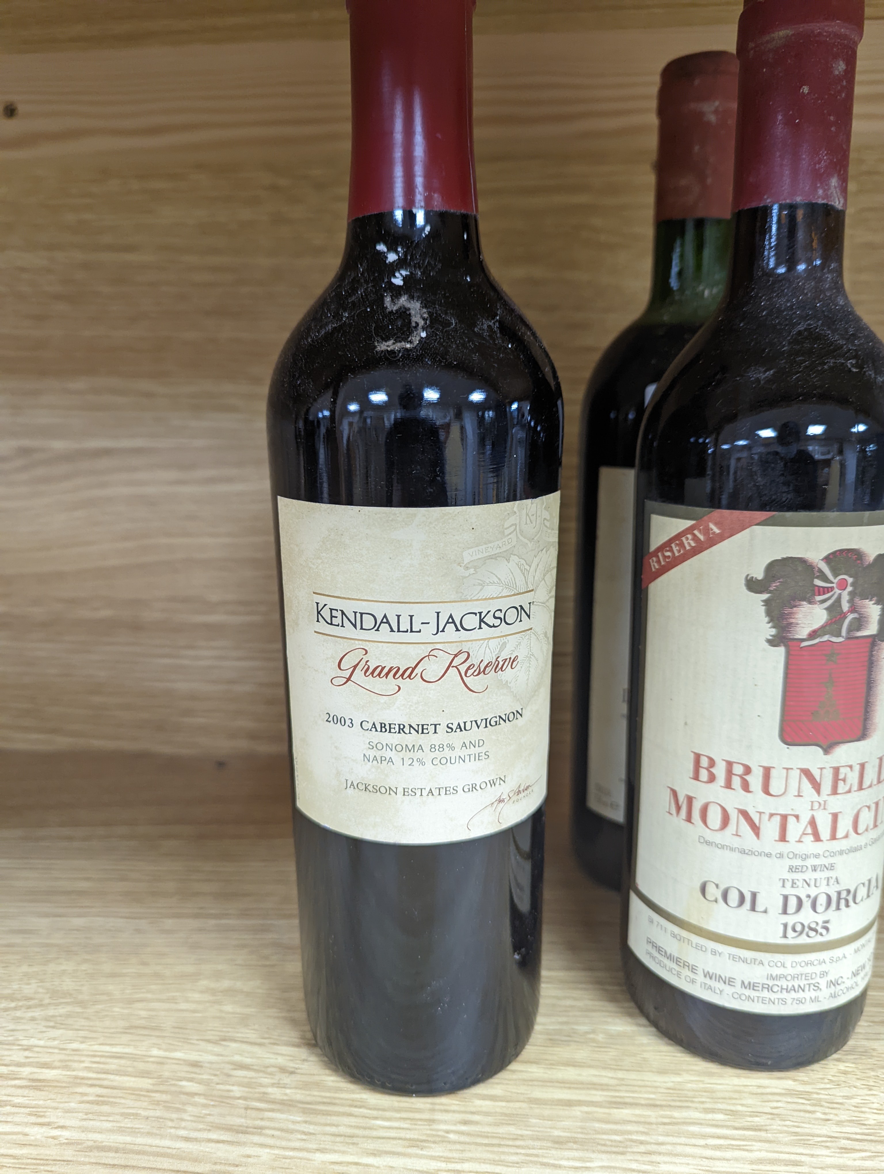 Twelve assorted bottles of wine including one Opus One, 1988, one Vosne Romanee, Jean Paul Selles, 1992, one Chateau Cazauviel, Margaux 1993, Chateau Pontet-Canet, 1986 and Brunello Montalcino, 1985 & 1991 etc.